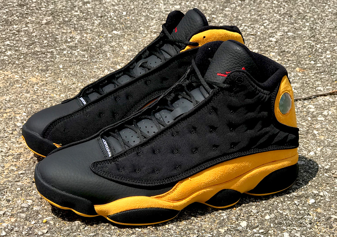 Jordan 13 Melo Graduation Black Yellow Red 2