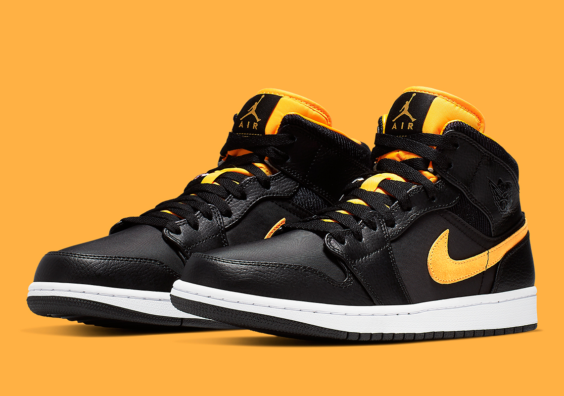 The Air Jordan 1 Mid Appears In Black And University Gold