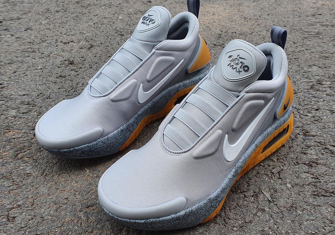 The Nike Adapt Auto Max Appears In A Grey And Yellow Colorway