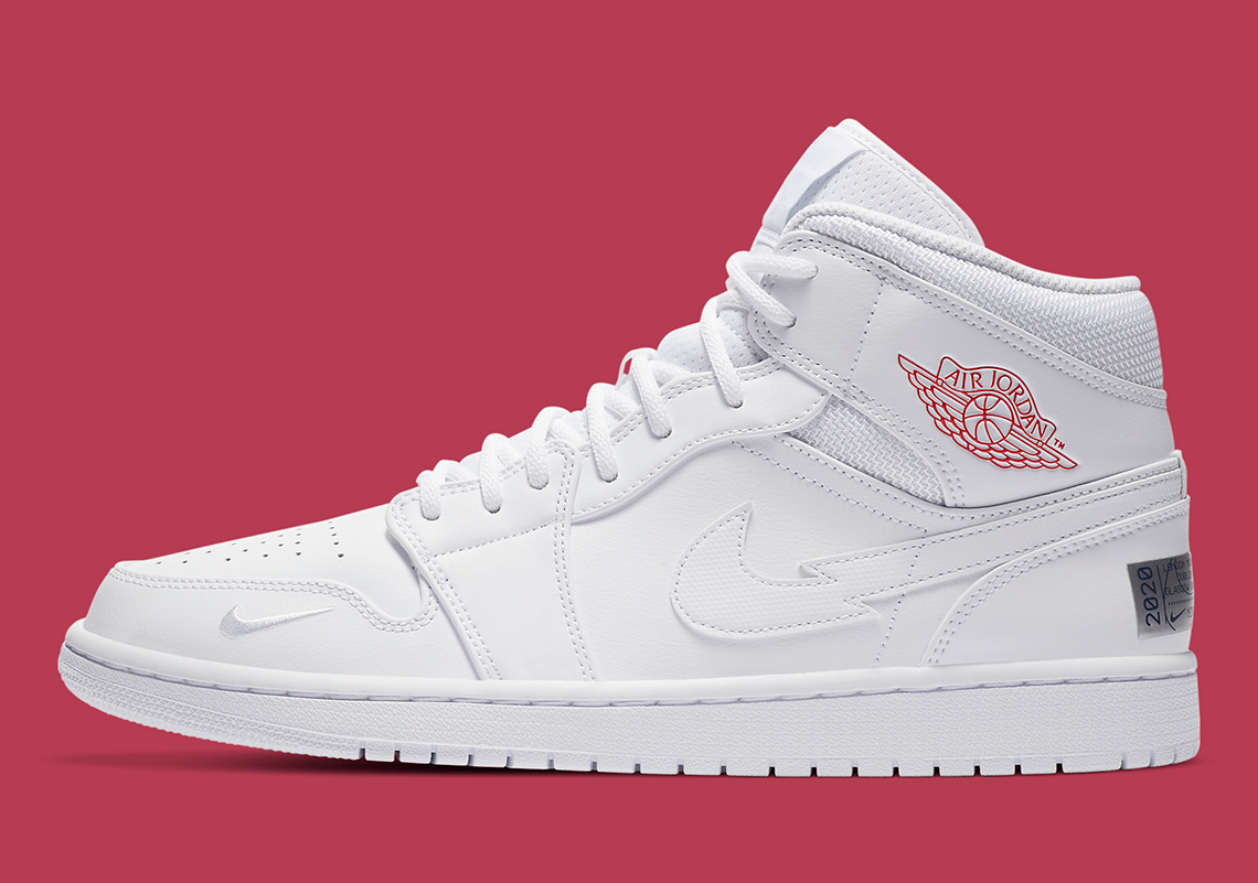 The Air Jordan 1 Mid "Nike Swoosh On Tour" Dials Up The Amps Through Its Logo